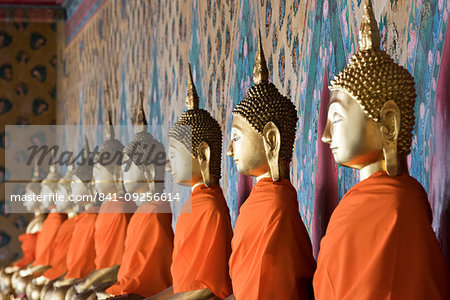 Seated Buddha statues in a row at Wat Pho (Wat Phra Chetuphon) (Temple of the Reclining Buddha), Bangkok, Thailand, Southeast Asia, Asia