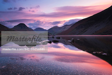 Pink clouds reflected in tranquil Wast Water, dawn, Wasdale, Lake District National Park, UNESCO World Heritage Site, Cumbria, England, United Kingdom, Europe