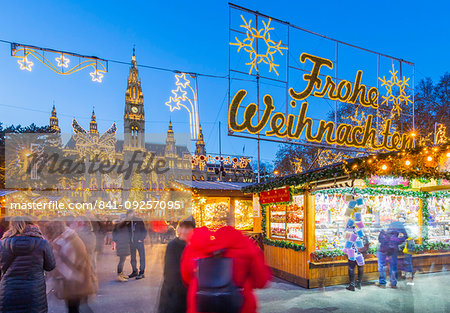 Rathaus and Christmas market stalls at night in Rathausplatz, Vienna, Austria, Europe