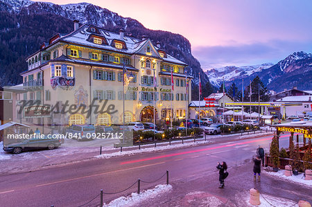 View of Hotel Dolomiti Canazei at dusk in winter, Canazei, Val di Fassa, Trentino, Italy, Europe