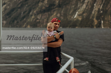 Father with baby on lake cruise, Queenstown, Canterbury, New Zealand