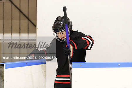 Girl in ice hockey uniform