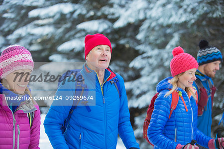 Family hiking in snow