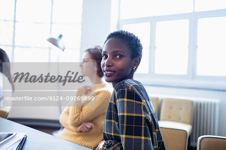 Portrait confident businesswoman in conference room meeting