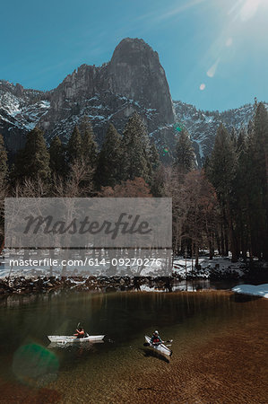Friends kayaking in lake, Yosemite Village, California, United States