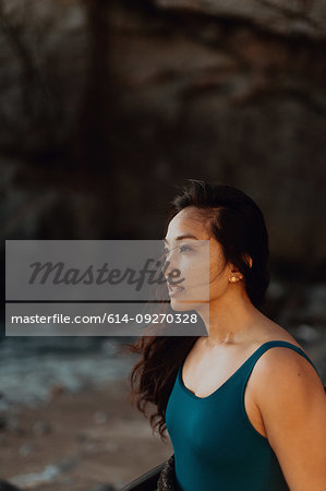 Woman enjoying breeze on beach, Big Sur, California, United States