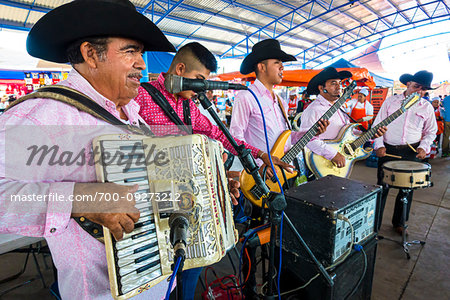 Band of musicians playing at the Tuesday Market in San Miguel de Allende, Guanajuato, Mexico