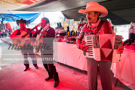 Band of musicians playing at the Tuesday Market in San Miguel de Allende, Guanajuato, Mexico