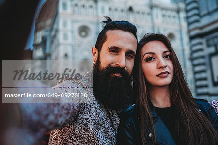 Couple taking selfie in cafe, Santa Maria del Fiore, Firenze, Toscana, Italy