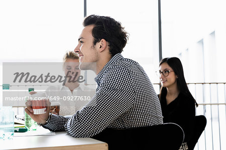 Businessman and businesswomen at meeting in office