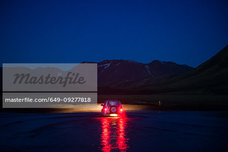 Off road vehicle in desert at night, Landmannalaugar, Highlands, Iceland