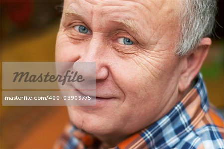 Casual bald senior man emotional portrait series.