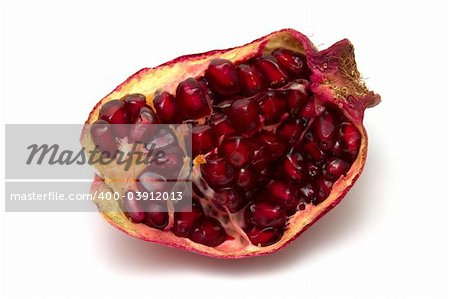 isolated pomegranate against white background