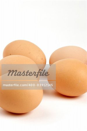 Multiple Eggs set against a plain background