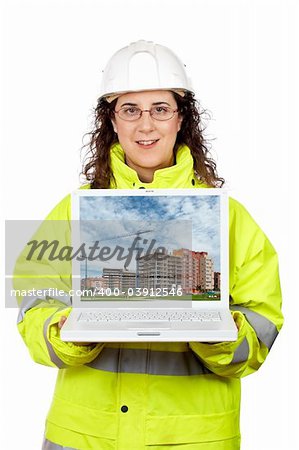 Female construction worker showing a building construction on the laptop.  Note: on screen image was also shot by me