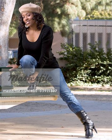 Portrait of African-American girl  in jeans and boots