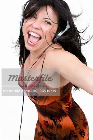 Charismatic woman dancing and enjoying upbeat music