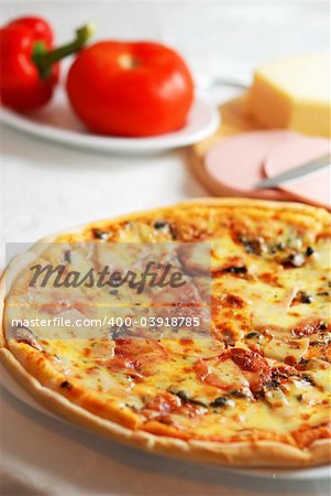 Pizza and ingredients, shalow dof