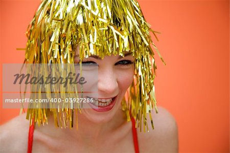 Holiday: beautiful girl having fun at a carnival party