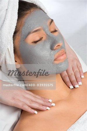 Girl with facial mask (eyes are closed)