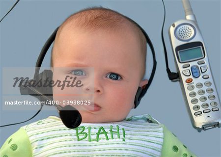 Baby with a headset on a blue background