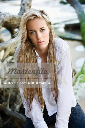 Pretty Caucasian woman posing on Maui, Hawaii beach.