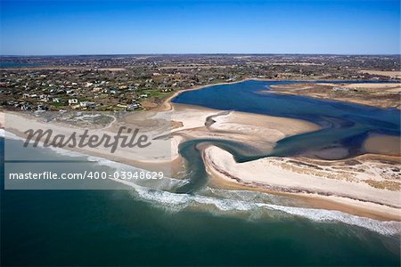 Aerial view of Southampton, New York with shoal and inlet.