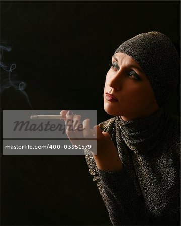 Lady with a cigarette on black background