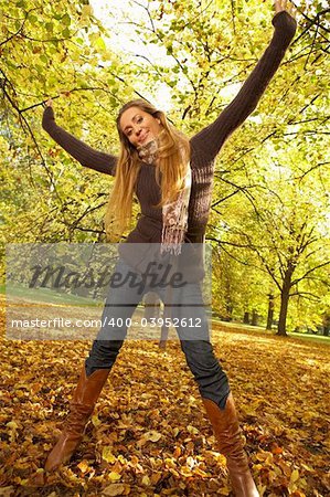 20-25 years old beautiful sexy woman portrait having fun in natural autumn outdoors