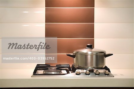 Modern kitchen / Saucepan on an oven