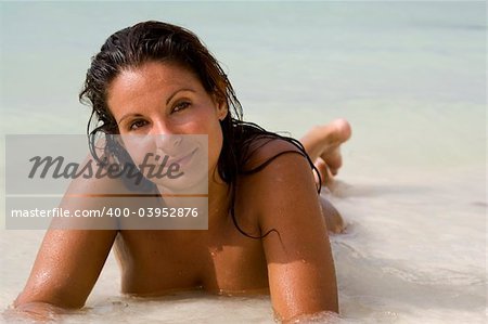 Nude Brunette Woman in Ocean Water