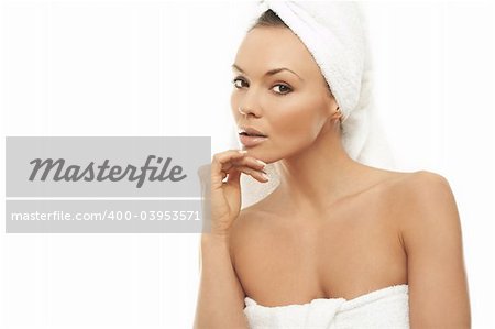 Portrait of Fresh and Beautiful brunette woman wearing white towel on her head