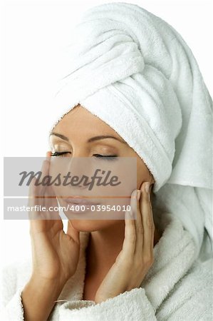 Portrait of Fresh and Beautiful brunette woman wearing white towel on her head