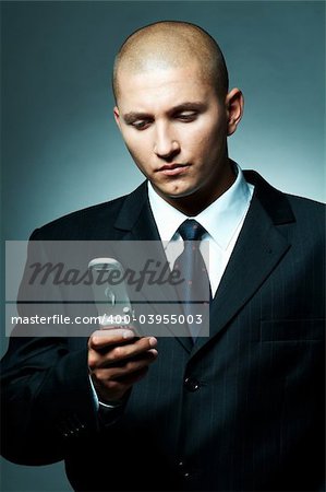 A Young businessman using cell phone