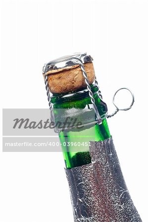 Detail of champagne cork over a white background