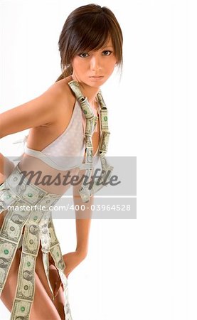 Young Japanese female clothed in US money