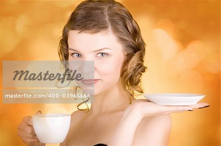 glamorous girl having a cup of coffee