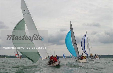 Yachts racing on a stormy day