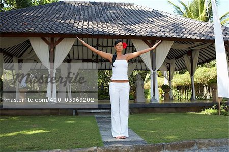 20-25 years woman portrait during yoga at exotic surrounding, bali indonesia