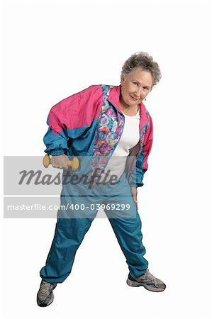 A full body view of a senior lady working out, stretching and using free weights.  Isolated on white.