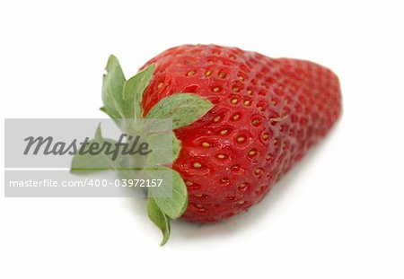 red strawberry macro on a white background