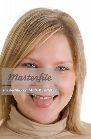 smiling blonde girl sticking out her tongue