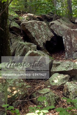 Small cave in a jumble of granite at Connors Farm in Smithfield, RI, USA