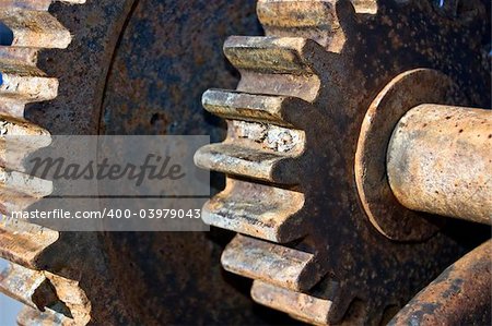 Rusty cogged wheels of an old mechanism