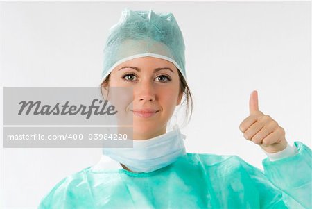 young nurse just after operation in surgery