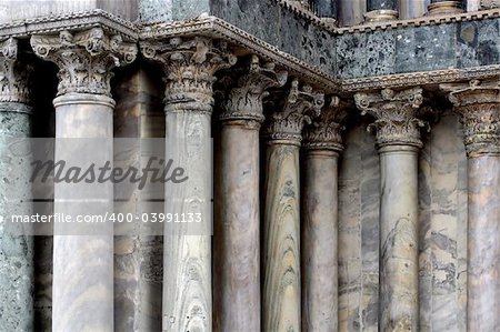 A series of marble columns in Venice Italy.