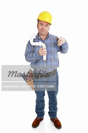 Confused construction worker using an electrical wire stripper on a plumbing pipe.  Full body isolated on white.