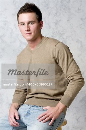 Cute male model in v-neck sweater