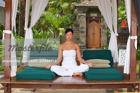 20-25 years woman portrait during yoga at exotic surrounding, bali indonesia