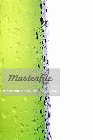 beer bottle side view, macro with water droplets isolated on white